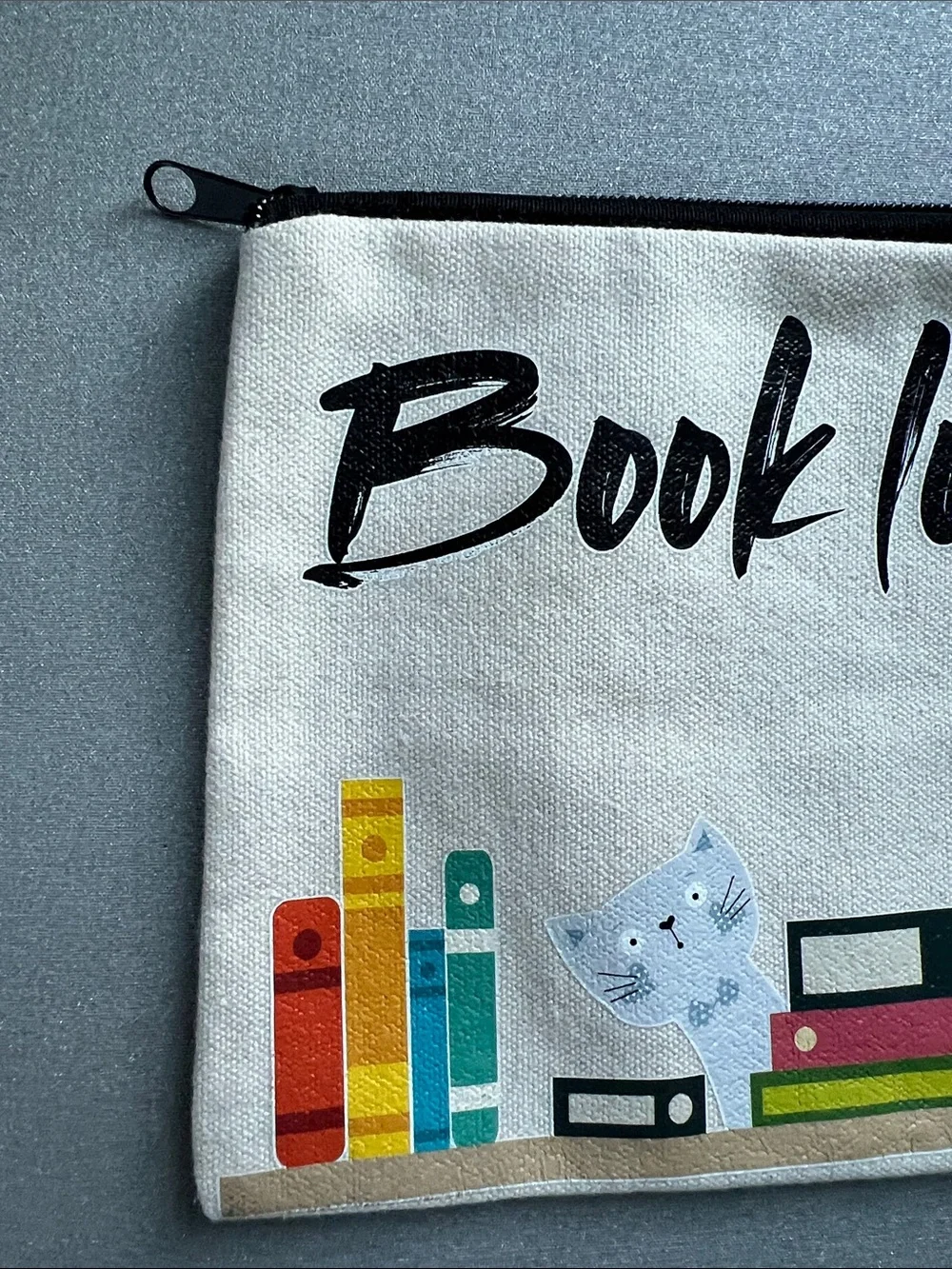 Book Lovers Canvas Zipper Pouch with Colorful Book Print Size 9” L x 6.5” W